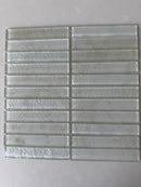 Roca Lux Dune 12x12 stacked glass mosaic tile for wall installation, featuring a sandy, textured beige design.
