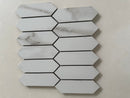 Calacatta marble picket mosaic installed as a luxury kitchen backsplash with polished finish
