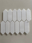 Dolomite honed marble picket mosaic tile featuring soft white and gray natural stone in a modern linear design