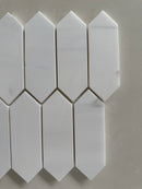 Dolomite marble picket mosaic used on a modern bathroom shower wall with clean linear layout
