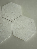 Shellstone Myra honed hexagon tile used as a kitchen backsplash