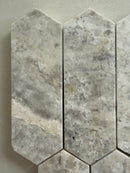 Honed Silver Travertine mosaic tile installed on a bathroom feature wall