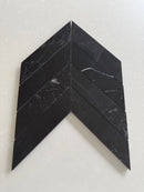 Nero Marquina polished 2x8 chevron marble mosaic tile with bold black stone and white veining