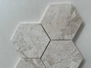 Polished marble hexagon mosaic tile featuring a timeless geometric pattern