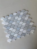 Roca Rockart blue mix Carrara Thassos fan-shaped 12x12 inch natural stone mosaic tile for flooring or backsplash.