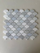 Roca Rockart blue mix Carrara Thassos fan-shaped 12x12 inch natural stone mosaic tile with blue, white, and gray tones.