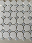 Natural stone tile by Roca featuring a blue mix Thassos circle mosaic for backsplash or wall decor, 12x12 inches.