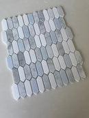 Natural stone tile from Roca, blue mix Thassos picket mosaic, 10x12 inch backsplash with textured stone pattern.