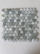 Natural stone tile mosaic featuring green mix penny round 12x12 Roca brand, showcasing small round tiles in various green shades.