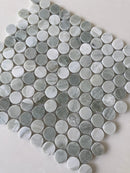 Natural stone tile mosaic featuring green mix penny round tiles by Roca, ideal for backsplashes and accent walls.