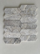 Modern Silver Travertine picket mosaic backsplash in a contemporary kitchen