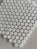 White Dolomite polished penny round mosaic tile with a timeless circular design